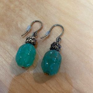 Green dangling, antique, gold earrings.